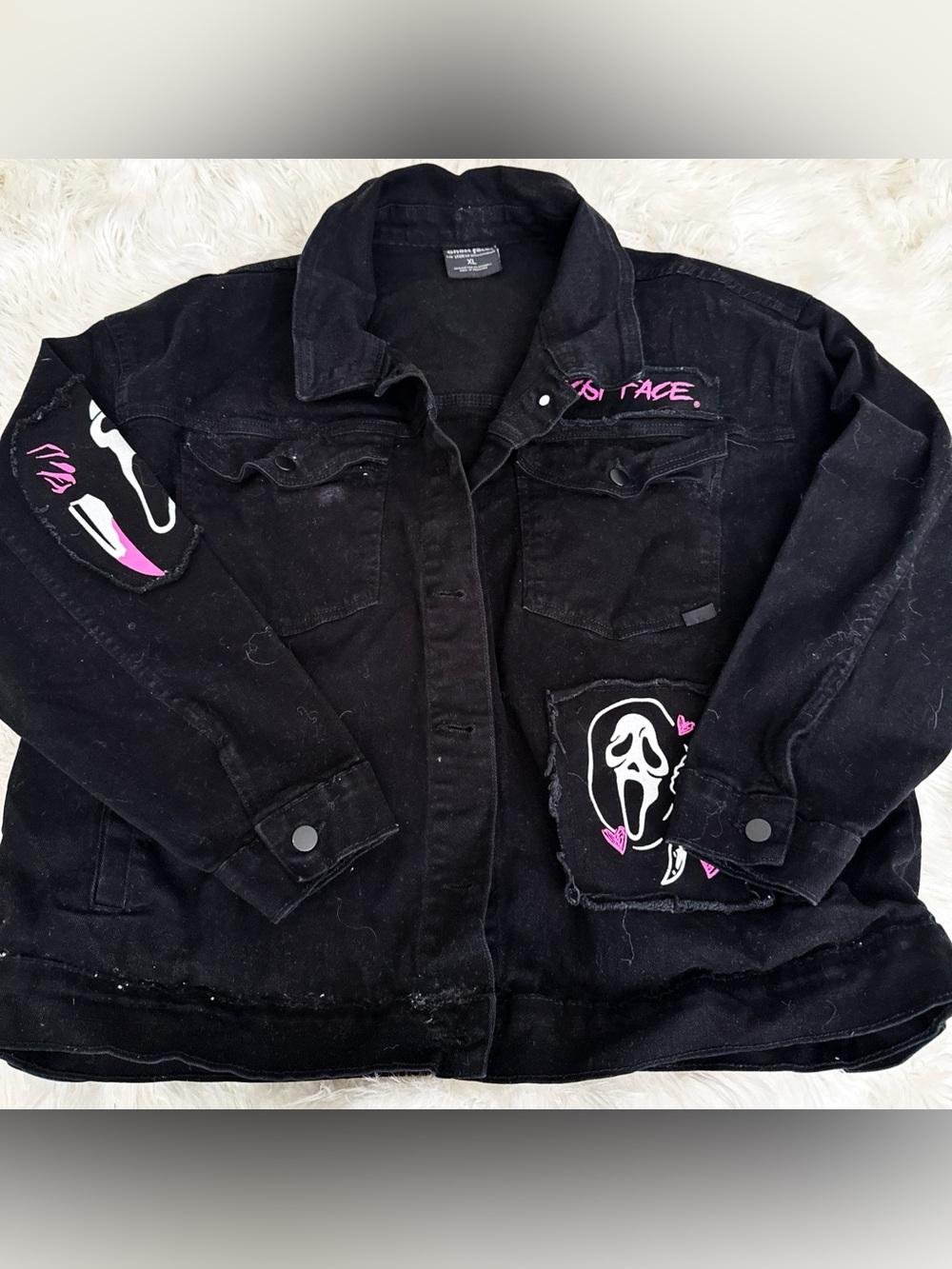 Black Graphic Denim Jacket with Pink Accents